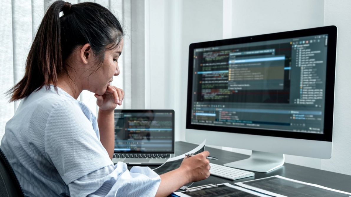Image of woman coding