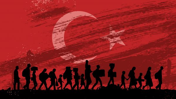 Refugees on Turkish-EU border turkey flag background