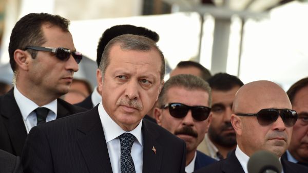 Turkish president Recep Tayyip Erdogan with bodyguards