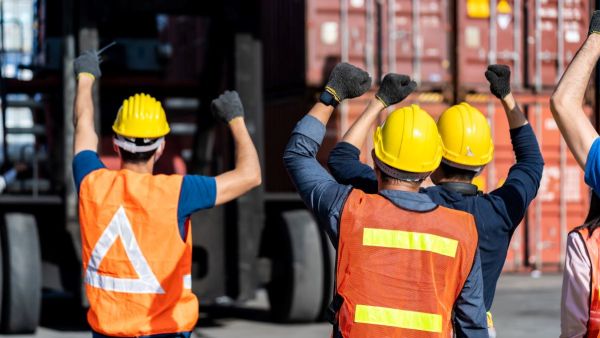 workers rights men in helmets