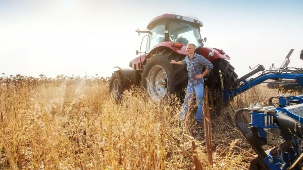 rural young farmers tractors field 