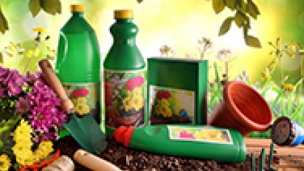 carcinogenic fertilizer products bottles iin garden 