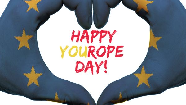 Hands painted with EU flags and words happy YOUrope day