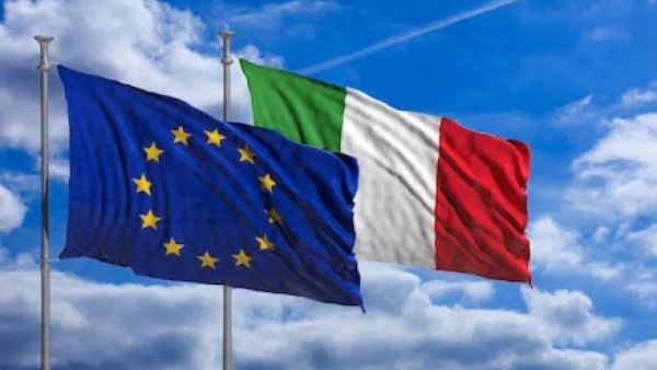 EU and Italy flags in front of clouds