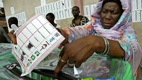 Nigerian woman casting her vote