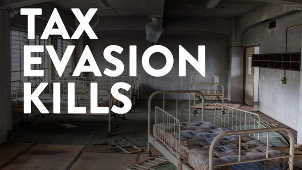 Tax Evasion Kills Derelict hospital ward with banner tax evasion kills