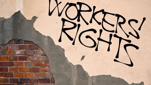 Wall and big letters WORKERS&#039; RIGHTS